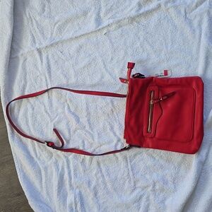 Red Leather crossbody purse by Charming Charlie.